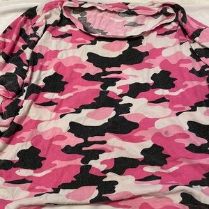 Medium short sleeve pink camouflage t shirt. Fits small as well.